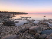 At the edge of the water at dusk, Lake Winnipeg