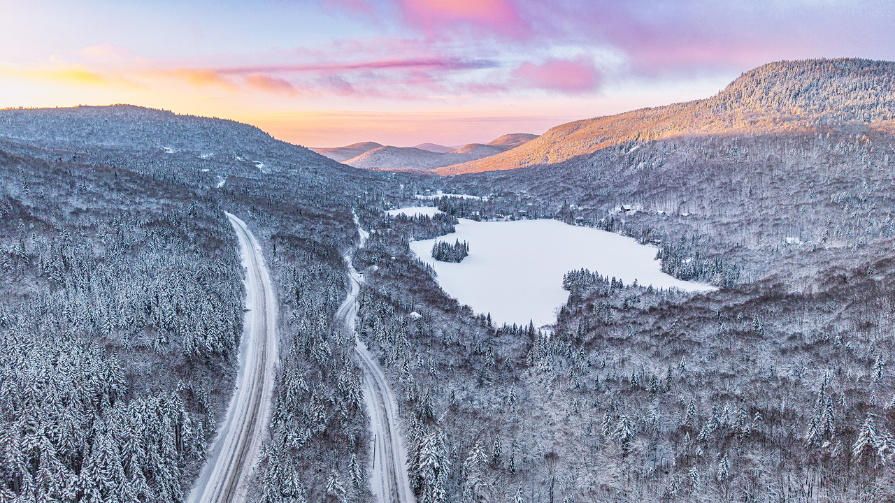 Sunrise over mountain and lake