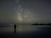 The milkyway with bioluminescent waves