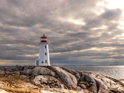 Peggy's Cove lighthouse on a cloudy afternoon