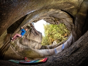 Georg Jost bouldering in "The Hole" hidden area. Squamish