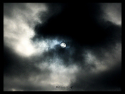 Sun Peeking Through The Clouds