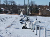Golf carts and fence posts lined up