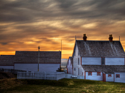 The Ryan Premises in Bonavista, Newfoundland with a Sunset Backdrop