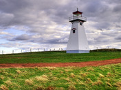 Cape Tryon Lighthouse overlooking the north coast of the island