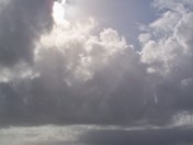Sun breaking through at Aphritite Lighthouse, Ucluelet, BC