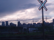 Toronto with the sun peaking through storm clouds