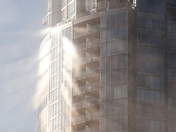 Sun shinning on foggy building