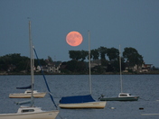 Fullmoon rising on the end of a boating day